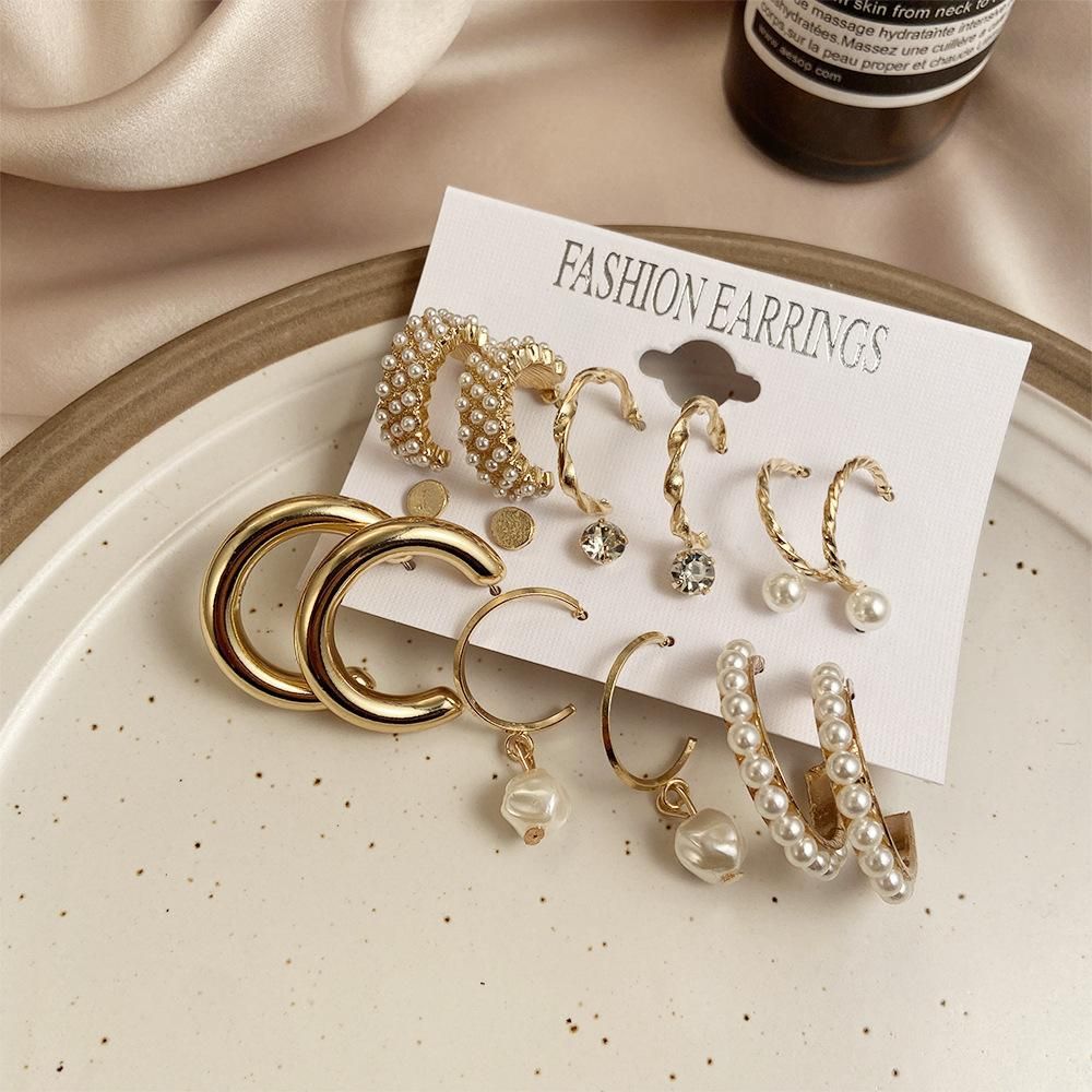 Combo Of 9 Stunning Gold Plated Pearl Studs and Hoop Earrings